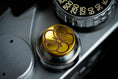 Load image into Gallery viewer, "Shutter button with flower engraving: Give your camera a luxury upgrade with this brass shutter button!"
