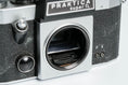 Load image into Gallery viewer, Praktica Super TL + Meyer-Optik Görlitz Domiplan 50mm f/2.8 + free 35mm film – Vintage SLR

