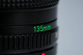 Load image into Gallery viewer, Canon FD 135mm f/2.8 Telephoto Lens – Powerful Portrait Lens with Beautiful Bokeh
