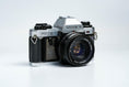 Load image into Gallery viewer, Yashica FX-70 Quartz + Yashica 50mm f/2 + Free Kodak Gold – Vintage 35mm SLR | Fully working
