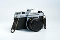 Load image into Gallery viewer, Pentax K1000 + SMC Pentax-M 50mm f/1.7 – Fully functional + free 35mm film
