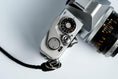 Load image into Gallery viewer, Canon FT QL + 50mm f/1.8 – Fully working + free 35mm film
