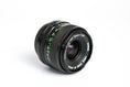 Load image into Gallery viewer, Canon FD 28mm f/2.8 – Classic Wide-Angle Lens for FD-mount
