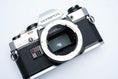 Load image into Gallery viewer, Olympus OM-10 – Zuiko 50mm f/1.8 + Free Kodak Gold 35mm Film
