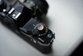 Load image into Gallery viewer, Handmade Engraved Relax Button – Vintage & Modern Camera Accessory

