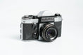 Load image into Gallery viewer, Praktica Super TL + Meyer-Optik Görlitz Domiplan 50mm f/2.8 + free 35mm film – Vintage SLR
