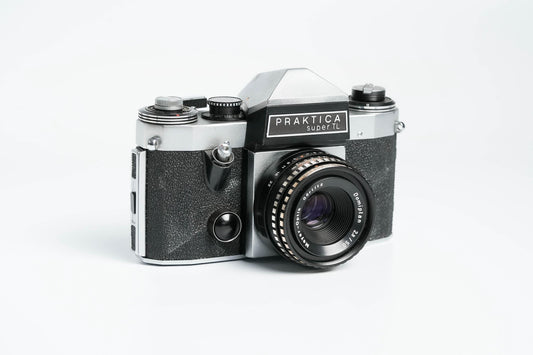 Praktica Super TL + Meyer-Optik Görlitz Domiplan 50mm f/2.8 + free 35mm film – Vintage SLR