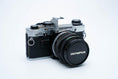 Load image into Gallery viewer, Olympus OM-10 – Olympus G.Zuiko 50mm f/1.4 + Free Kodak Gold 35mm Film
