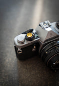 Load image into Gallery viewer, Upgrade your camera with our brass or aluminum shutter button!
