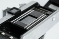 Load image into Gallery viewer, Praktica L + Carl Zeiss Jena 50mm f/2.8 + Free 35mm film – Classic DDR SLR
