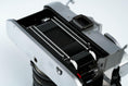 Load image into Gallery viewer, Canon FTb QL + 35-70mm f/3.5-4.5 – Fully working + free 35mm film
