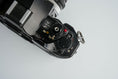 Load image into Gallery viewer, Canon A-1 Black – Vintage 35mm SLR with Canon FD 50mm f/1.8 Lens – Tested and Working
