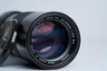 Load image into Gallery viewer, Canon FD 100-200mm f/5.6 S.C. Telezoom – Vintage Classic with Montreal 1976 Lens Hood
