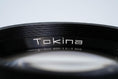 Load image into Gallery viewer, Tokina 135mm f/2.8 – Vintage Telephoto Lens for Canon FD
