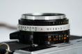 Load image into Gallery viewer, Olympus 35 SP + G. Zuiko 42mm f/1.7 + Free Kodak Gold – Rare rangefinder | Fully working | With learning cover and lens cap
