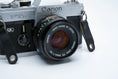 Load image into Gallery viewer, Canon FTb + 50mm f/1.8 + Free Kodak Gold 35mm
