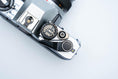 Load image into Gallery viewer, Olympus OM-10 – Olympus G.Zuiko 50mm f/1.4 + Free Kodak Gold 35mm Film
