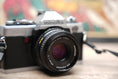 Load image into Gallery viewer, Minolta XG1 + 45mm f1.2
