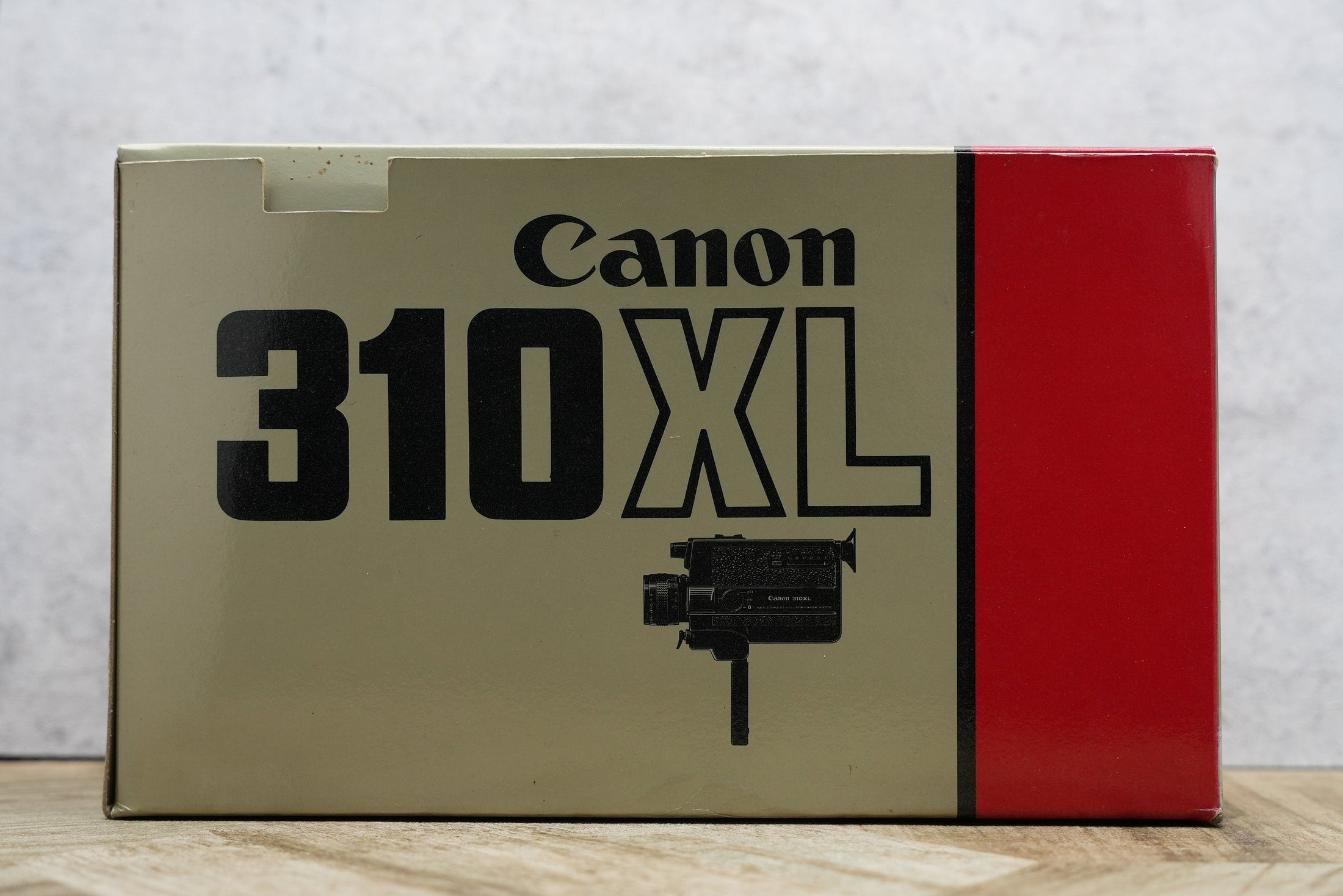 Canon 310XL + protective case + lens cap + box